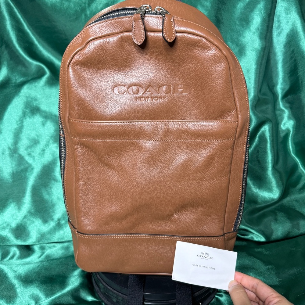 COACH Charles Slim Leather Backpack in dark saddle